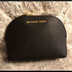 NWT Michael Kors Jet Set travel/makeup pouch.